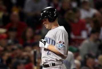 BOSTON - SEPTEMBER 28:  Aaron Hill #2 of the Toronto Blue Jays crosses home plate after his solo home run in the first inning against the Boston Red Sox on September 28, 2009 at Fenway Park in Boston, Massachusetts.  (Photo by Elsa/Getty Images)