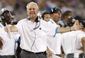 ARLINGTON, TX - SEPTEMBER 28:  Head coach John Fox of the Carolina Panthers reacts to a play from the sidelines against the Dallas Cowboys at Cowboys Stadium on September 28, 2009 in Arlington, Texas. (Photo by Ronald Martinez/Getty Images)