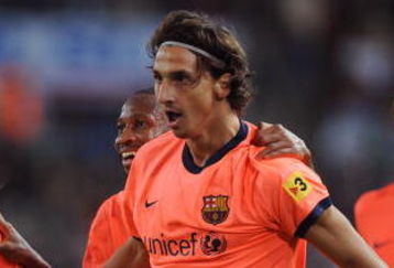 MALAGA, SPAIN - SEPTEMBER 26:  Zlatan Ibrahimovic (C) of Barcelona celebrates teammates after scoring his team's opening goal during the La Liga match between Malaga and Barcelona at La Rosaleda Stadium on September 26, 2009 in Malaga, Spain.  (Photo by Denis Doyle/Getty Images)