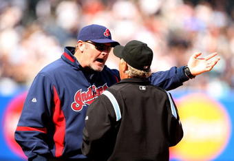 NEW YORK - APRIL 19:  Cleveland Indians manager Eric Wedge argues with the umpire about a Jorge Posada #20 of the New York Yankees pinch hit two-run home run in the seventh inning of their game against the Cleveland Indians at Yankee Stadium on April 19, 2009 in the Bronx borough of New York City.  The hit was reviewed by instant replay, and was ruled a home run.  (Photo by Ezra Shaw/Getty Images)