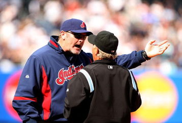 NEW YORK - APRIL 19:  Cleveland Indians manager Eric Wedge argues with the umpire about a Jorge Posada #20 of the New York Yankees pinch hit two-run home run in the seventh inning of their game against the Cleveland Indians at Yankee Stadium on April 19, 2009 in the Bronx borough of New York City.  The hit was reviewed by instant replay, and was ruled a home run.  (Photo by Ezra Shaw/Getty Images)