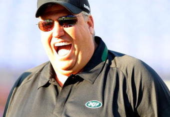 BALTIMORE - AUGUST 24:  Head coach Rex Ryan (R) of the New York Jets talks with players before a game against the Baltimore Ravens at M&T Bank Stadium on August 24, 2009 in Baltimore, Maryland.  (Photo by Greg Fiume/Getty Images)