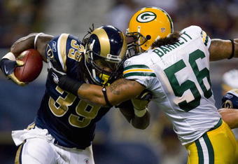 ST. LOUIS, MO - SEPTEMBER 27: Steven Jackson #39 of the St. Louis Rams rushes against Nick Barnett #56 of the Green Bay Packers at the Edward Jones Dome on September 27, 2009 in St. Louis, Missouri.  (Photo by Dilip Vishwanat/Getty Images)
