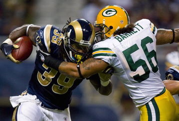 ST. LOUIS, MO - SEPTEMBER 27: Steven Jackson #39 of the St. Louis Rams rushes against Nick Barnett #56 of the Green Bay Packers at the Edward Jones Dome on September 27, 2009 in St. Louis, Missouri.  (Photo by Dilip Vishwanat/Getty Images)
