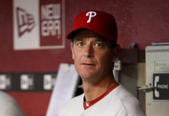 PHOENIX - JULY 28:  Pitcher Jamie Moyer#50 of the Philadelphia Phillies looks on from the dugout during the major league baseball game against the Arizona Diamondbacks at Chase Field on July 28, 2009 in Phoenix, Arizona. The Phillies defeated the Diamondbacks 4-3.  (Photo by Christian Petersen/Getty Images)