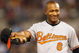 KANSAS CITY - MAY 14:  Melvin Mora #6 of the Baltimore Orioles walks off the field with Cesar Izturis #3 against the Kansas City Royals on May 14, 2009 at Kauffman Stadium in Kansas City, Missouri. (Photo by: Jamie Squire/Getty Images)