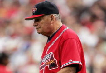 ATLANTA - OCTOBER 05:  Manager Bobby Cox #6 of the Atlanta Braves walks toward the pitching mound to releive starting pitcher Tim Hudson #15 in the seventh innning against the Houston Astros in Game One of the 2005 National League Divison Series on October 5, 2005 at Turner Field in Atlanta, Georgia.  (Photo by Brian Bahr/Getty Images)