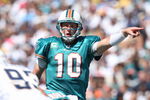 SAN DIEGO, CA - SEPTEMBER 27:  Quarterback Chad Pennington #10 of the Miami Dolphins at the line of scrimmage against the San Diego Chargers at Qualcomm Stadium on September 27, 2009 in San Diego, California. (Photo by Donald Miralle/Getty Images)