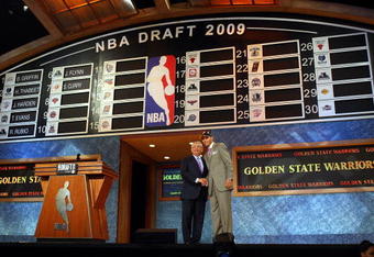 NEW YORK - JUNE 25:  NBA Commissioner David Stern poses for a photograph with the seventh overall draft pick by the Golden State Warriors,  Stephen Curry during the 2009 NBA Draft at the Wamu Theatre at Madison Square Garden June 25, 2009 in New York City. NOTE TO USER: User expressly acknowledges and agrees that, by downloading and/or using this Photograph, User is consenting to the terms and conditions of the Getty Images License Agreement.  (Photo by Jim McIsaac/Getty Images)