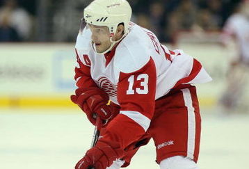 COLUMBUS, OHIO - APRIL 23:  Pavel Datsyuk #13 of the Detroit Red Wings skates with the puck against the Columbus Blue Jackets during Game Four of the Western Conference Quarterfinals of the 2009 Stanley Cup Playoffs on April 23, 2009 at the Nationwide Arena in Columbus, Ohio. The Red Wings defeated the Blue Jackets 6-5 on a late goal by Johan Franzen to eliminate the Blue Jackets 4 games to 0. (Photo by Claus Andersen/Getty Images