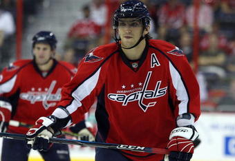 WASHINGTON DC, DC - SEPTEMBER 23:  Alex Ovechkin #8 of the Washington Capitals skates against the Chicago Blackhawks during their preseason game on September 23, 2009 at the Verizon Center in Washington, DC.  (Photo by Jim McIsaac/Getty Images)