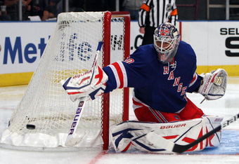 NEW YORK - SEPTEMBER 24:  Henrik Lundqvist #30 of the New York Rangers makes a save against of the Washington Capitals during their preseason game on  September 24, 2009 at Madison Square Garden in New York City.  (Photo by Jim McIsaac/Getty Images)