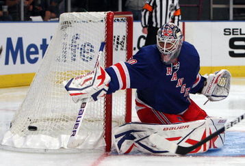 NEW YORK - SEPTEMBER 24:  Henrik Lundqvist #30 of the New York Rangers makes a save against of the Washington Capitals during their preseason game on  September 24, 2009 at Madison Square Garden in New York City.  (Photo by Jim McIsaac/Getty Images)