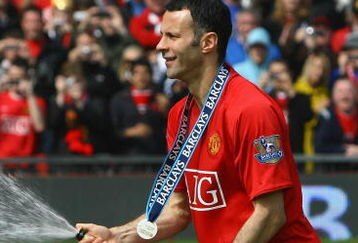 MANCHESTER, ENGLAND - MAY 16:  Ryan Giggs of Manchester United celebrates winning the Barclays Premier League trophy after the Barclays Premier League match between Manchester United and Arsenal at Old Trafford on May 16, 2009 in Manchester, England.  (Photo by Alex Livesey/Getty Images)