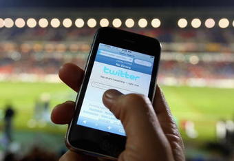 NEWCASTLE, AUSTRALIA - JULY 11:  In this photo illustration the Twitter website is displayed on a mobile phone at a NRL match on July 11, 2009 in Newcastle, Australia. The micro-blogging phenomenon sees users post text 'tweets' of upto 140 characters in response to the question 'What are you doing?'.  (Photo by Cameron Spencer/Getty Images)