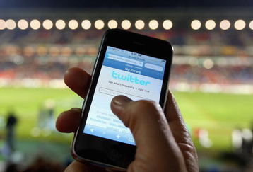 NEWCASTLE, AUSTRALIA - JULY 11:  In this photo illustration the Twitter website is displayed on a mobile phone at a NRL match on July 11, 2009 in Newcastle, Australia. The micro-blogging phenomenon sees users post text 'tweets' of upto 140 characters in response to the question 'What are you doing?'.  (Photo by Cameron Spencer/Getty Images)