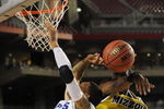 GLENDALE, AZ - MARCH 26:  Guard J.T. Tiller #4 of the Missouri Tigers blocks a shot by guard Roburt Sallie #3 of the Memphis Tigers in the Sweet 16 of the NCAA Division I Men's Basketball Tournament at the University of Phoenix Stadium on March 26, 2009 in Glendale, Arizona.  (Photo by Ronald Martinez/Getty Images)