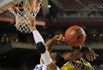 GLENDALE, AZ - MARCH 26:  Guard J.T. Tiller #4 of the Missouri Tigers blocks a shot by guard Roburt Sallie #3 of the Memphis Tigers in the Sweet 16 of the NCAA Division I Men's Basketball Tournament at the University of Phoenix Stadium on March 26, 2009 in Glendale, Arizona.  (Photo by Ronald Martinez/Getty Images)
