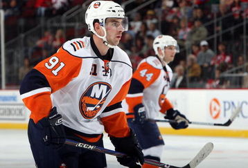 NEWARK, NJ - SEPTEMBER 29:  John Tavares #91 of the New York Islanders skates against the New Jersey Devils during their preseason game at the Prudential Center on September 29, 2009 in Newark, New Jersey.  (Photo by Jim McIsaac/Getty Images)