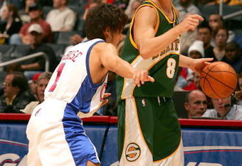 LOS ANGELES - OCTOBER 27:  Luke Ridnour #8 of the Seattle SuperSonics moves the ball against Yuta Tabuse #1 of the Los Angeles Clippers during the NBA preseason game on October 27, 2005 at Staples Center in Los Angeles, California.  NOTE TO USER:  User expressly acknowledges and agrees that, by downloading and or using this photograph, User is consenting to the terms and conditions of the Getty Images License Agreement.  (Photo by Robert Laberge/Getty Images)