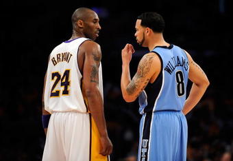 LOS ANGELES, CA - APRIL 19:  Kobe Bryant #24 of the Los Angeles Lakers talks with Deron Williams #8 of the Utah Jazz in Game One of the Western Conference Quarterfinals during the 2009 NBA Playoffs at Staples Center on April 19, 2009 in Los Angeles, California. NOTE TO USER: User expressly acknowledges and agrees that, by downloading and or using this photograph, User is consenting to the terms and conditions of the Getty Images License Agreement.  (Photo by Kevork Djansezian/Getty Images)