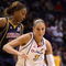 PHOENIX - SEPTEMBER 29: Diana Taurasi #3 of the Phoenix Mercury drives past Tamika Catchings #24 of the Indiana Fever in Game One of the 2009 WNBA Finals at US Airways Center on August 29, 2009 in Phoenix, Arizona. The Mercury defeated the Fever 120-116 in overtime to take a 1-0 series lead. NOTE TO USER: User expressly acknowledges and agrees that, by downloading and or using this photograph, User is consenting to the terms and conditions of the Getty Images License Agreement. (Photo by Christian Petersen/Getty Images)