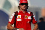 VALENCIA, SPAIN - AUGUST 22:  Kimi Raikkonen of Finland and Ferrari arrives in the paddock before qualifying for the European Formula One Grand Prix at the Valencia Street Circuit on August 22, 2009, in Valencia, Spain.  (Photo by Ryan Pierse/Getty Images)