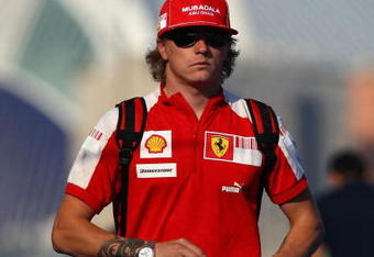 VALENCIA, SPAIN - AUGUST 22:  Kimi Raikkonen of Finland and Ferrari arrives in the paddock before qualifying for the European Formula One Grand Prix at the Valencia Street Circuit on August 22, 2009, in Valencia, Spain.  (Photo by Ryan Pierse/Getty Images)