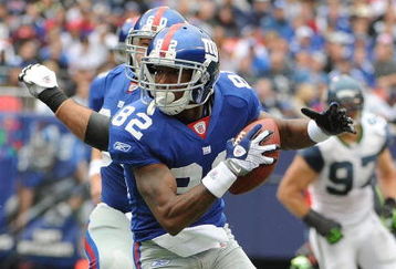 EAST RUTHERFORD, NJ - OCTOBER 05:  Mario Manningham #82 of the New York Giants plays against the Seattle Seahawks during their game on October 5, 2008 at Giants Stadium in East Rutherford, New Jersey.  (Photo by Al Bello/Getty Images)