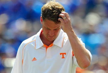 GAINESVILLE, FL - SEPTEMBER 19:  Head coach Lane Kiffin of the Tennessee Volunteers watches the action prior to the game against the Florida Gators at Ben Hill Griffin Stadium on September 19, 2009 in Gainesville, Florida.  (Photo by Sam Greenwood/Getty Images)
