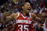 ST. LOUIS, MISSOURI. - APRIL 5: Angel McCoughtry #35 of the Louisville Cardinals celebrates blocking a shot against the Oklahoma Sooners during the NCAA Women's Final Four Semifinals at the Scottrade Center on April 5, 2009 in St. Louis, Missouri. (Dilip Vishwanat/Getty Images)