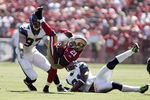 SAN FRANCISCO - SEPTEMBER 20:  Running back Frank Gore #21 of the San Francisco 49ers breaks a tackle by cornerback Ken Lucas #31 and defensive end Patrick Kerney of the Seattle Seahawks in the first quarter during the home opener at Candlestick Park on September 20, 2009 in San Francisco, California.  (Photo by David Paul Morris/Getty Images)