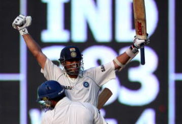 CHENNAI, INDIA - DECEMBER 15:  Yuvraj Singh of India lifts his team mate Sachin Tendulkarafter their team's victory on day 5 of the First Test Match between India and England at the MA Chidambaram Stadium on December 15, 2008 in Chennai, India.  (Photo by Julian Herbert/Getty Images)