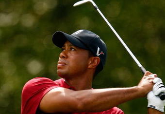 ATLANTA - SEPTEMBER 27:  Tiger Woods watches a shot on the fifth hole during the final round of THE TOUR Championship presented by Coca-Cola, the final event of the PGA TOUR Playoffs for the FedExCup, at East Lake Golf Club on September 27, 2009 in Atlanta, Georgia.  (Photo by Scott Halleran/Getty Images)