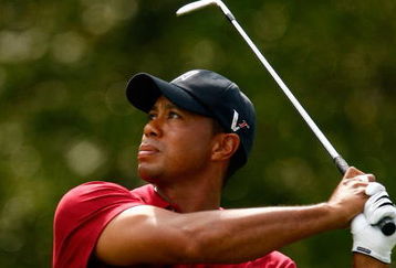 ATLANTA - SEPTEMBER 27:  Tiger Woods watches a shot on the fifth hole during the final round of THE TOUR Championship presented by Coca-Cola, the final event of the PGA TOUR Playoffs for the FedExCup, at East Lake Golf Club on September 27, 2009 in Atlanta, Georgia.  (Photo by Scott Halleran/Getty Images)