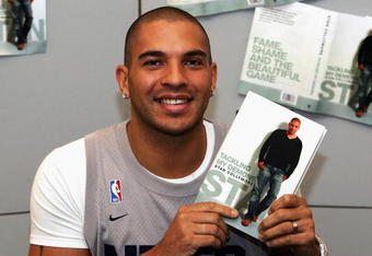HERTFORDSHIRE, ENGLAND -  OCTOBER 21: Ex-footballer Stan Collymore signs copies of his autobiography 'Stan: Tackling My Demons' at WHSmith Watford on October 21, 2004 in Hertfordshire, England. (Photo by Gareth Cattermole/Getty Images)