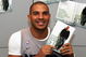 HERTFORDSHIRE, ENGLAND - OCTOBER 21: Ex-footballer Stan Collymore signs copies of his autobiography 'Stan: Tackling My Demons' at WHSmith Watford on October 21, 2004 in Hertfordshire, England. (Photo by Gareth Cattermole/Getty Images)