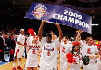 NEW YORK - MARCH 14:  Andre McGee #33 of the Louisville Cardinals celebrates after defeating the Syracuse Orange during to win championship game of the Big East Tournament at Madison Square Garden on March 14, 2009 in New York City.  (Photo by Jim McIsaac/Getty Images)