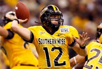 NEW ORLEANS - DECEMBER 21: Quarterback Austin Davis #12 of the Southern Mississippi Golden Eagles looks to throw a pass against the Troy Trojans during the R+L Carriers New Orleans Bowl on December 21, 2008 at the Superdome in New Orleans, Louisiana. Davis was named MVP after defeating the Trojans 30-27 in overtime. (Photo by Chris Graythen/Getty Images)