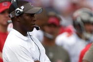 TAMPA, FL - SEPTEMBER 27:  Head coach Raheem Morris of the Tampa Bay Buccaneers watches his team from the sideline against the New York Giants during the game at Raymond James Stadium on September 27, 2009 in Tampa, Florida.  (Photo by J. Meric/Getty Images)