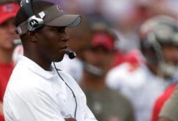 TAMPA, FL - SEPTEMBER 27:  Head coach Raheem Morris of the Tampa Bay Buccaneers watches his team from the sideline against the New York Giants during the game at Raymond James Stadium on September 27, 2009 in Tampa, Florida.  (Photo by J. Meric/Getty Images)