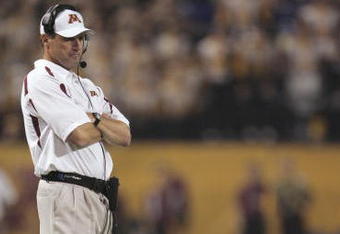 MINNEAPOLIS, MN - SEPTEMBER 29:  Head coach Tim Brewster of the Minnesota Golden Gophers looks on against the Ohio State Buckeyes during the game at the Metrodome on September 29, 2007 in Minneapolis, Minnesota.  Ohio State defeated Minnesota 30-7. (Photo by Jeff Gross/Getty Images)