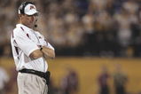 MINNEAPOLIS, MN - SEPTEMBER 29:  Head coach Tim Brewster of the Minnesota Golden Gophers looks on against the Ohio State Buckeyes during the game at the Metrodome on September 29, 2007 in Minneapolis, Minnesota.  Ohio State defeated Minnesota 30-7. (Photo by Jeff Gross/Getty Images)