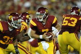 LOS ANGELES, CA - SEPTEMBER 26:  Quarterback Matt Barkley #7 of the USC Trojans drops back to hand off against the Washington State Cougars on September 23, 2009 at the Los Angeles Coliseum in Los Angeles, California.  USC won 27-6.  (Photo by Stephen Dunn/Getty Images)