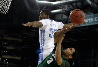 DETROIT - APRIL 06:  Chris Allen #3 of the Michigan State Spartans has his shot attempt blocked in the second half by Ed Davis #32 of the North Carolina Tar Heels during the 2009 NCAA Division I Men's Basketball National Championship game at Ford Field on April 6, 2009 in Detroit, Michigan.  (Photo by Andy Lyons/Getty Images)