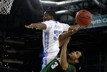 DETROIT - APRIL 06:  Chris Allen #3 of the Michigan State Spartans has his shot attempt blocked in the second half by Ed Davis #32 of the North Carolina Tar Heels during the 2009 NCAA Division I Men's Basketball National Championship game at Ford Field on April 6, 2009 in Detroit, Michigan.  (Photo by Andy Lyons/Getty Images)