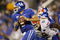 LEXINGTON, KY - SEPTEMBER 26: Quarterback Mike Hartline #5 of the Kentucky Wildcats looks to pass during the third quarter of the game against the Florida Gators at Commonwealth Stadium on September 26, 2009 in Lexington, Kentucky. (Photo by Andy Lyons/Getty Images)