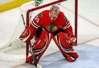 CHICAGO - MAY 24:  Goalie Corey Crawford #50 of the Chicago Blackhawks stands in goal against the Detroit Red Wings during Game Four of the Western Conference Championship Round of the 2009 Stanley Cup Playoffs on May 24, 2009 at the United Center in Chicago, Illinois. The Red Wings won 6-1. (Photo by Jim Prisching/Getty Images)