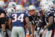 FOXBORO, MA - SEPTEMBER 27: Quarterback Tom Brady #12 of the New England Patriots talks in a team huddle during the third quarter of the game against the Atlanta Falcons at Gillette Stadium on September 27, 2009 in Foxboro, Massachusetts. (Photo by Jim Rogash/Getty Images)