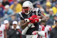 FOXBORO, MA - SEPTEMBER 27:  Randy Moss #81 of the New England Patriots makes the catch for the first down as Brent Grimes #20 of the Atlanta Falcons defends on September 27, 2009 at Gillette Stadium in Foxboro, Massachusetts. The Patriots defeated the Falcons 26-10.  (Photo by Elsa/Getty Images)